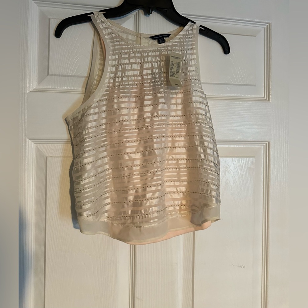 American Eagle Outfitters Cream Textured Tank Top is a size XSTP.